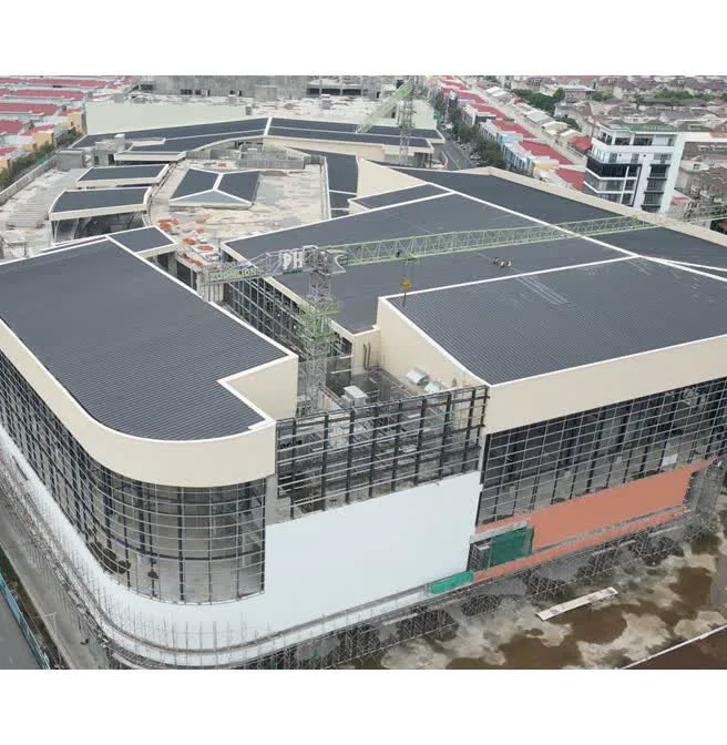 Aerial photo of PH Eco Mall under construction amid the Star Platinum borey rooftops on National Road 1