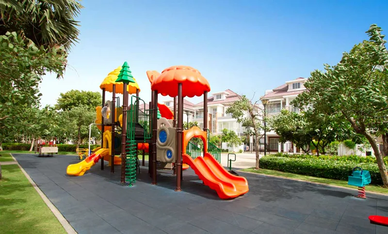 Children's playground at The Star Eternal with villas in the background