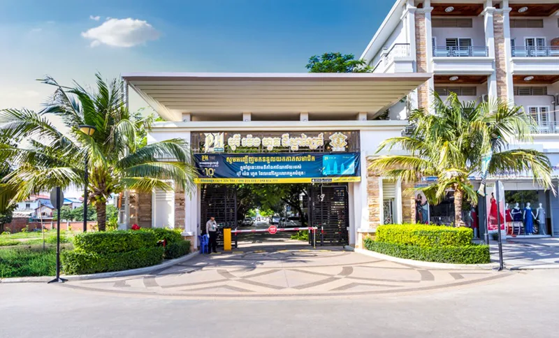 The Star Light main entrance gate with the Peng Huoth PH emblem, Sen Sok, Phnom Penh