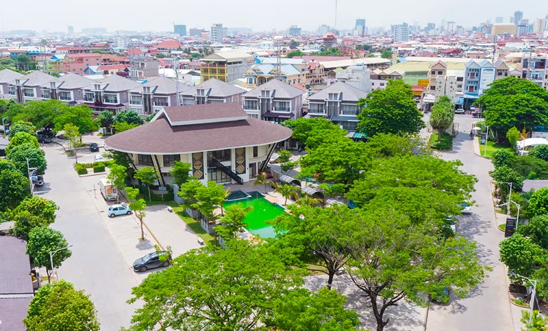 Aerial view of The Star Natural central clubhouse, swimming pool and surrounding villas