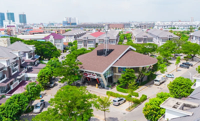 Aerial view of villa rows and the Lucky Express commercial hub at The Star Natural