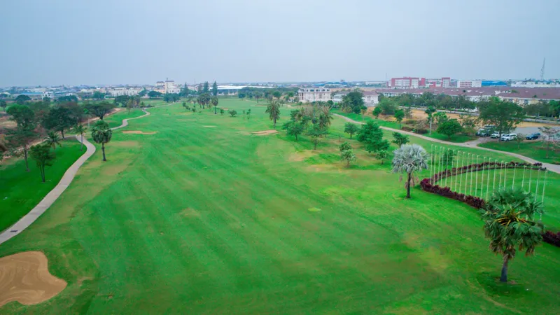 Aerial view over the golf course and villas at Grand Phnom Penh City township