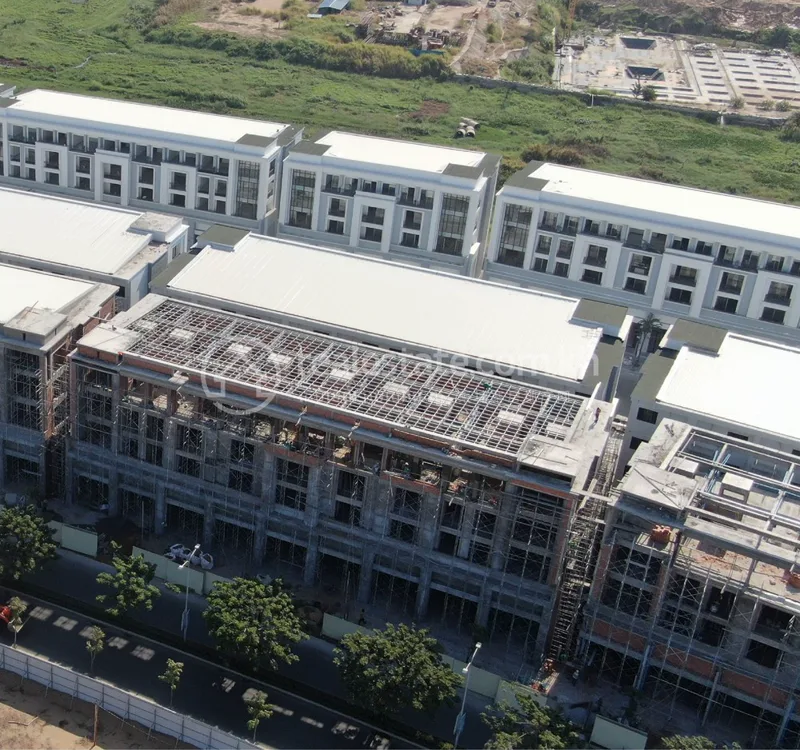 Aerial photo of rows of shophouses under construction at Chip Mong Landmark 271 in Phnom Penh