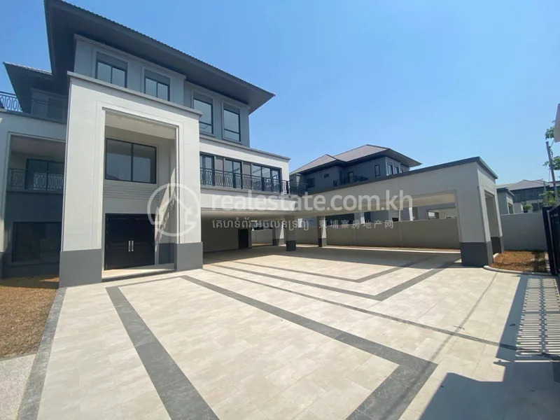 Photo of a completed King Villa at Chip Mong Land Landmark 60M, showing the tiled forecourt and finished facade