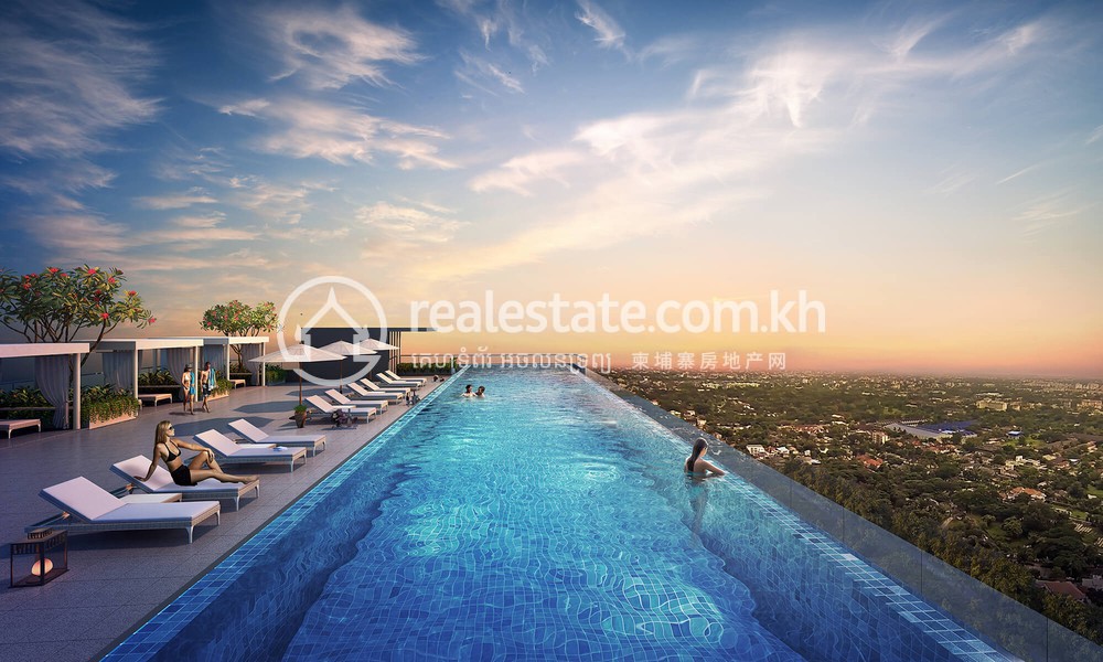 Rooftop infinity pool overlooking Phnom Penh at sunset