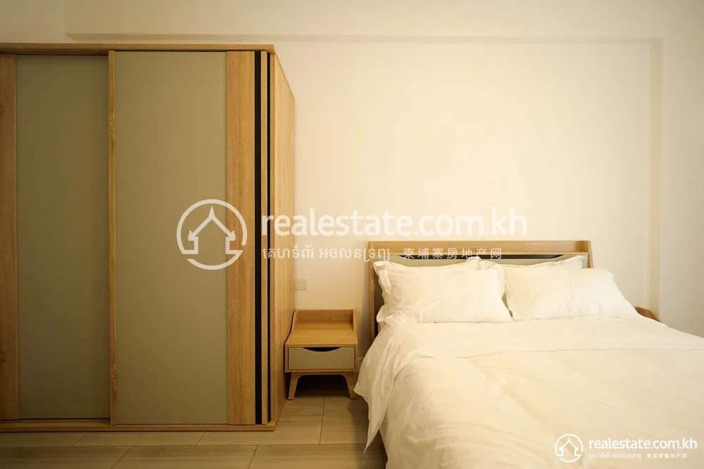 Furnished bedroom with built-in wardrobe in a Bodaiju Residences unit
