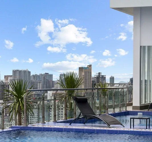 Swimming pool at LZ Sea View Residences with sea views