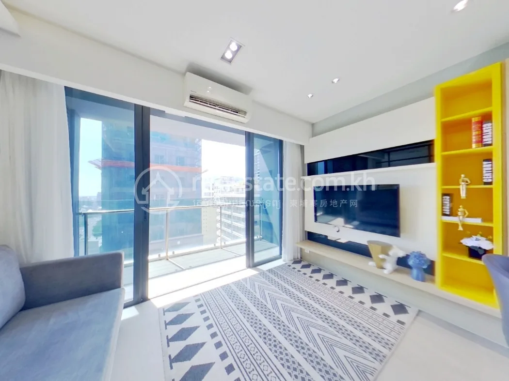 Furnished living room in a Time Square 1 show unit, BKK1, with balcony city views