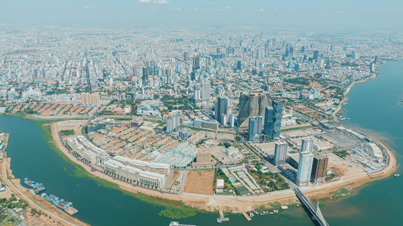 Aerial drone view over Koh Pich (Diamond Island) and downtown Phnom Penh