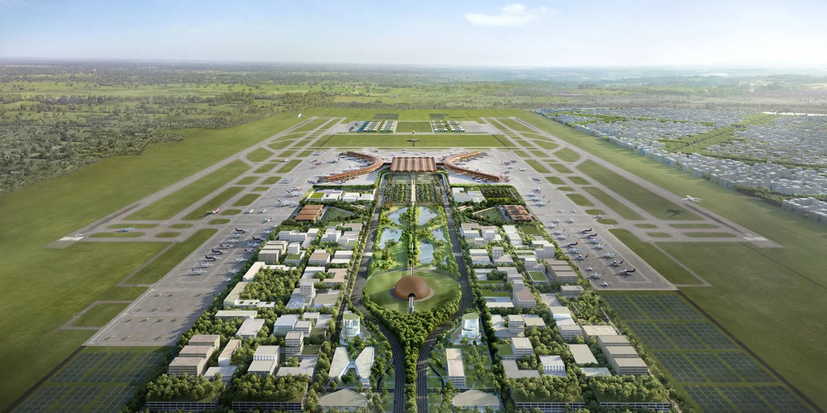 Aerial view of the Techo International Airport terminal and apron in Kandal province, surrounded by the land bank for the TIA City aerotropolis