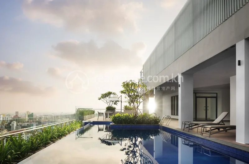 Rooftop swimming pool and sun deck at Embassy Residences overlooking Phnom Penh