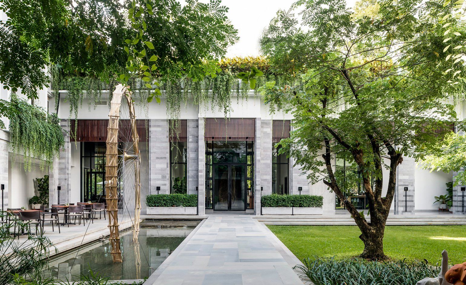 Treeline Urban Resort stone courtyard and entrance, Siem Reap
